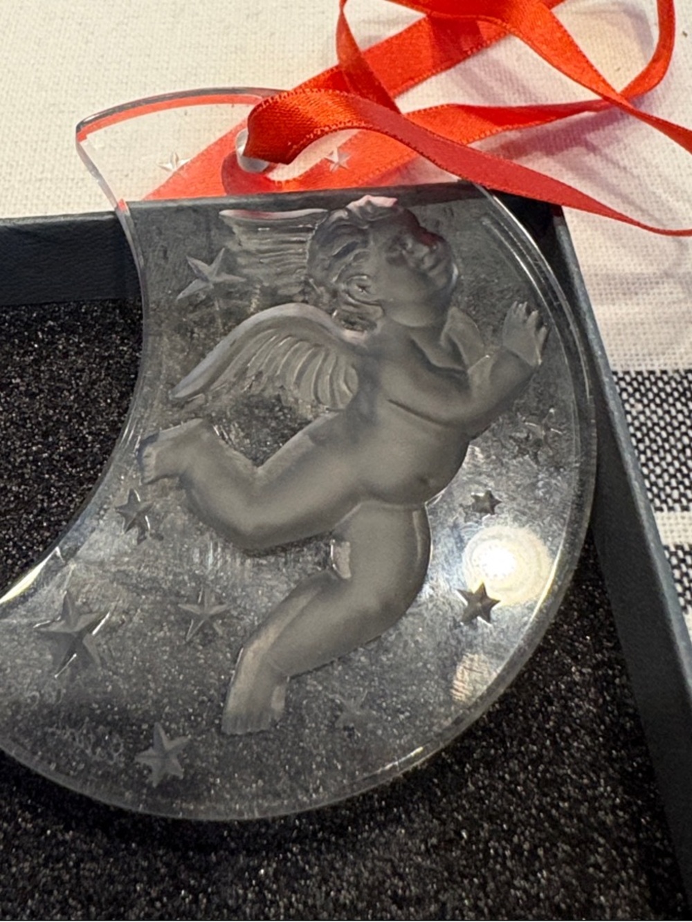 Vintage 1988 Lalique Crystal Cherub on Crescent Moon Christmas ornament.